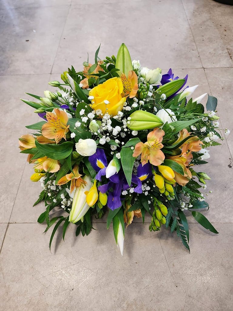 Mixed seasonal arrangement shaped by the best of what the flowers are doing at that moment
